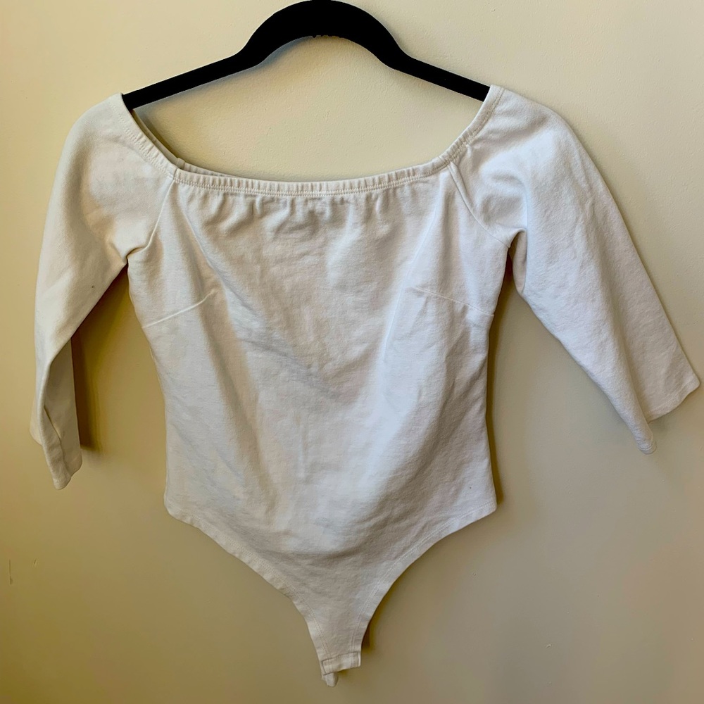 Like a bird off the shoulder white body suit